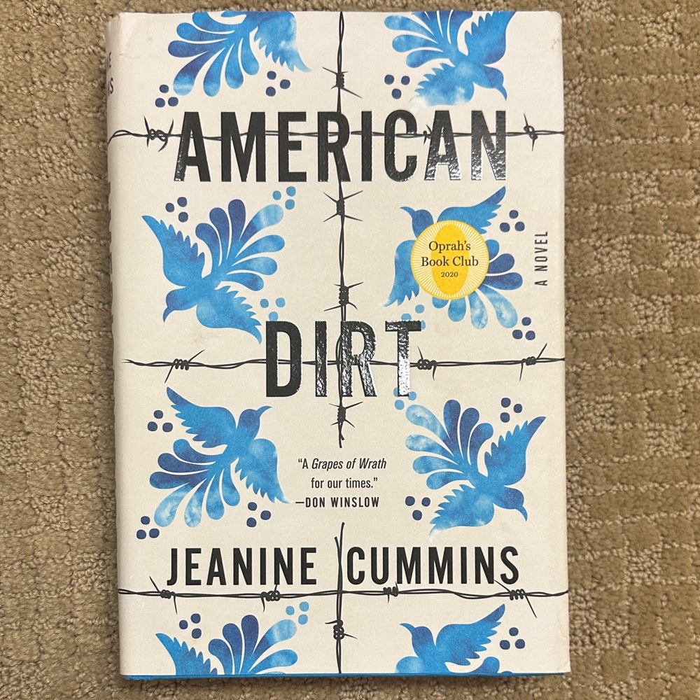 American Dirt by - Blue and White Cover